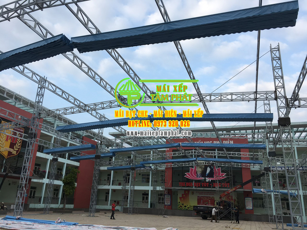 Mái xếp, mái hiên, mái bạt kéo, mái che Thủ Dầu Một, Bình Dương 15 Cơ sở Mái xếp Thủ Dầu Một của Tâm Phát thi công lắp đặt mái bạt kéo che sân trường học
